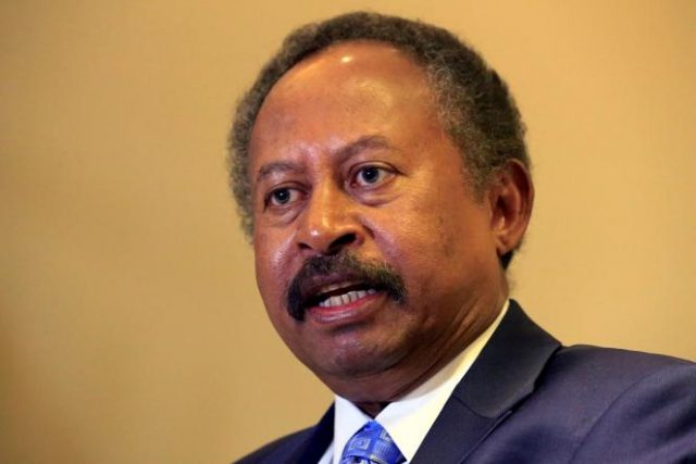 FILE PHOTO: Sudan's new Prime Minister in the transitional government Abdalla Hamdok, speaks during a Reuters interview in Khartoum