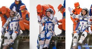 Chine: retour des taïkonautes après une mission de six mois dans la station spatiale