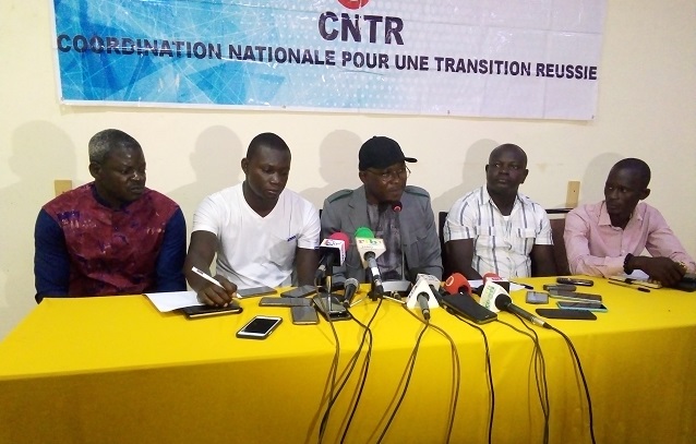 Les responsables de la CNTR. Pascal Zaïda (micro), coordonnateur national de l'Organisation