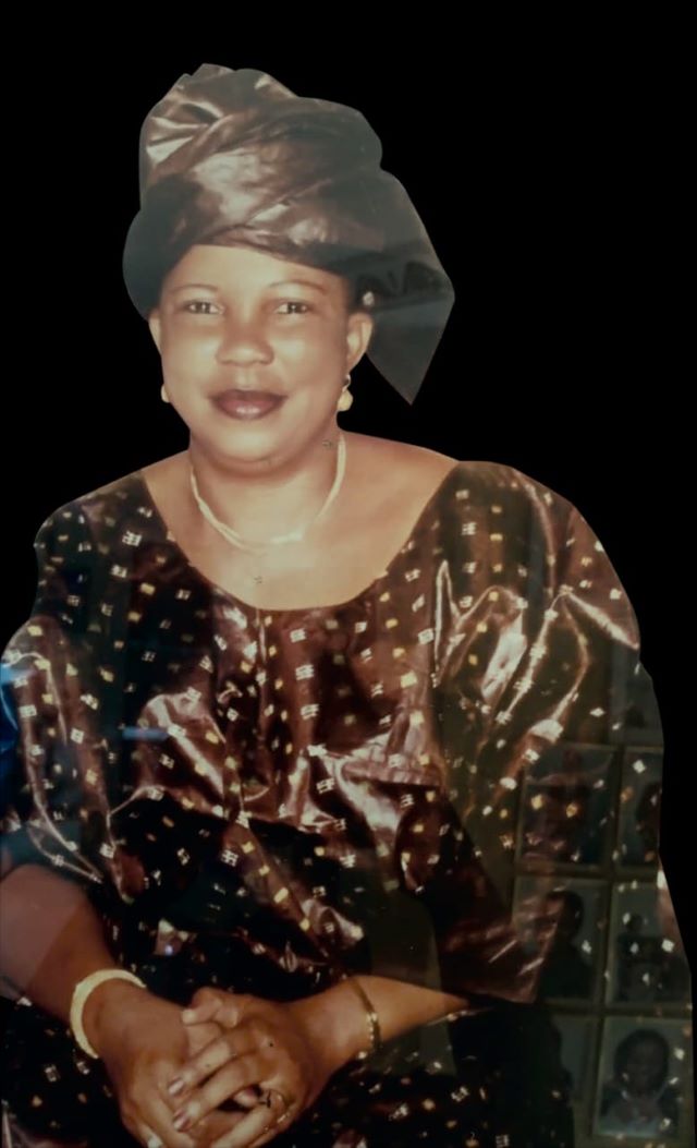 Mme Sigué